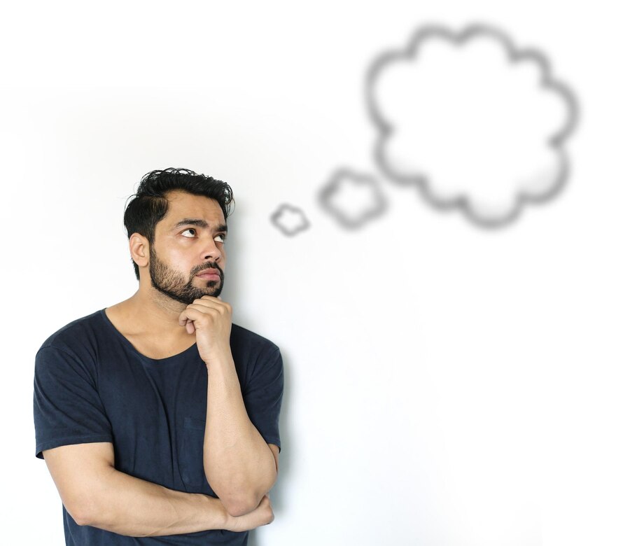 Man thinking with chat bubble