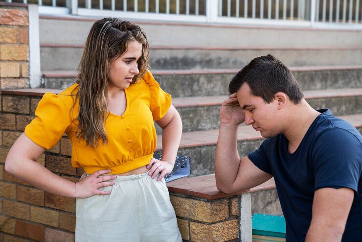 woman judging scolding man