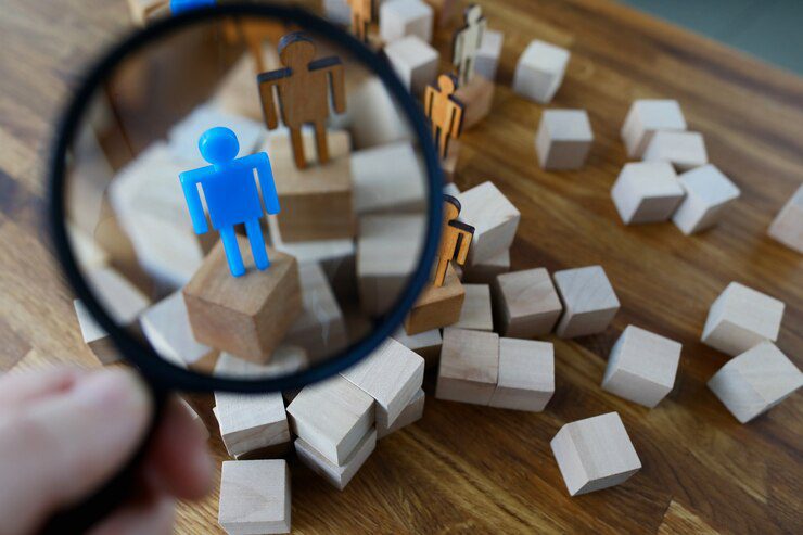 Businessman hold in hand magnifying glass