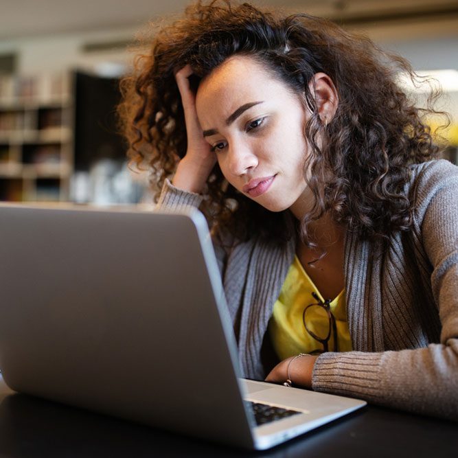 Student woman finding it difficult at study and comprehend scool tasks