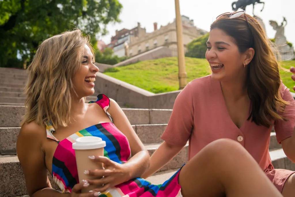Making Friends in NYC - two young friends spending time together and talking