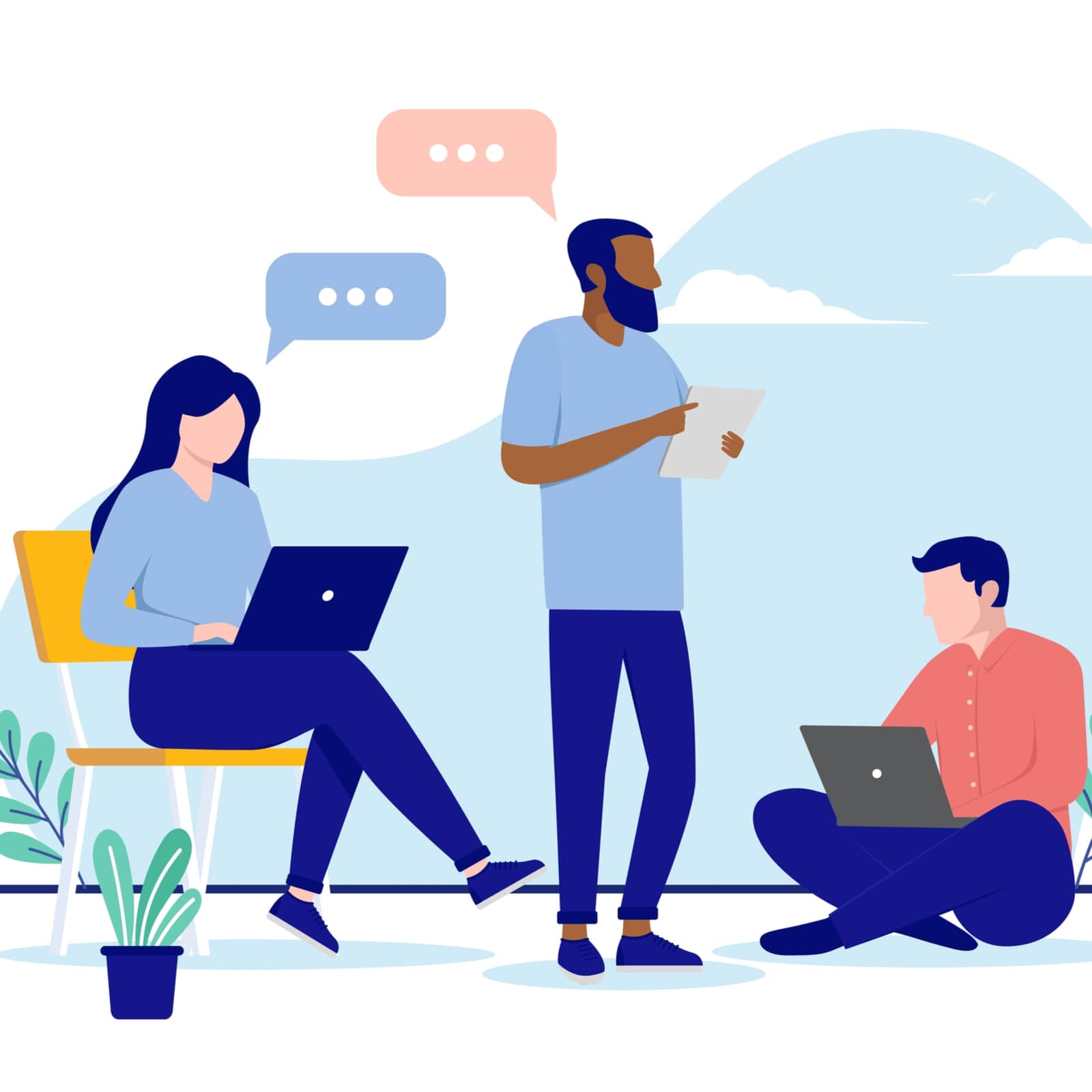 Team of casual business men and woman working on compute