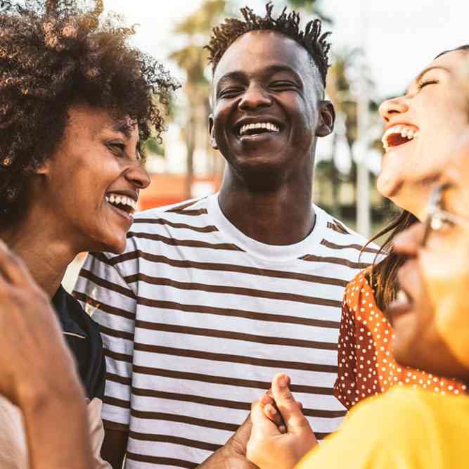 Young happy people laughing together