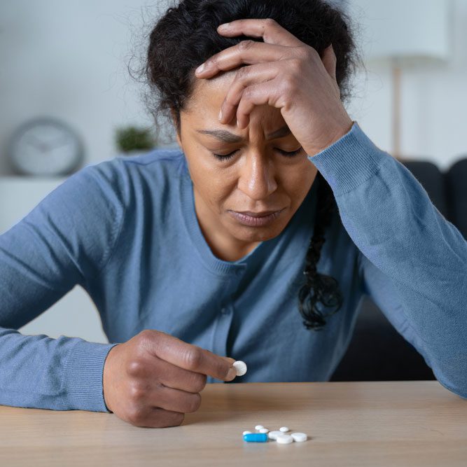 Depressed black woman portrait suffering for addiction