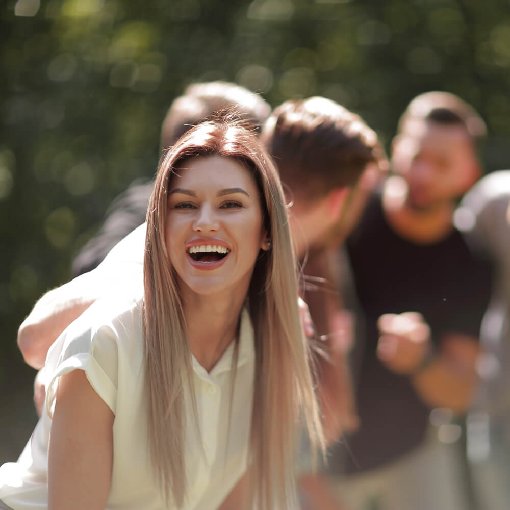 Group of people outdoors, exploring difficulties in making like-minded friends in NYC.