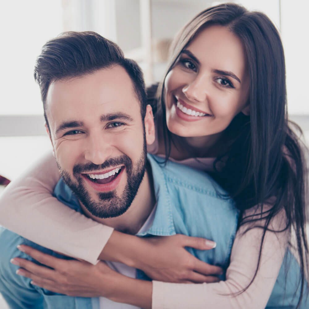 Two people embracing, exploring conflict avoidance in relationships in NYC.