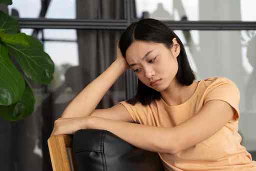 Woman processing a heartfelt family discovery, New York City.