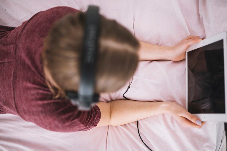 porn addiction - a girl with headphones and ipad
