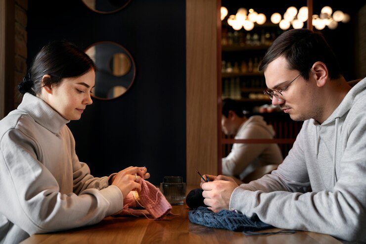 young adults knitting outside 23 2149431819 Uncover Mental Health Counseling