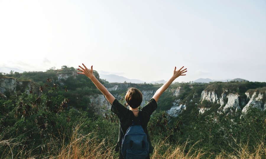 keys to a happy life - a woman watching and enjoying the beautiful nature