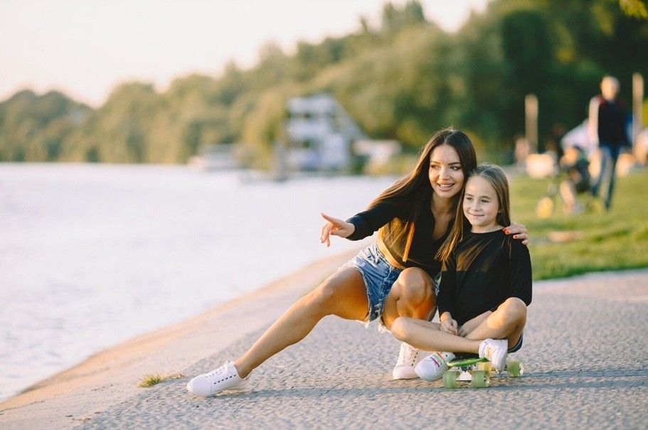 parentified daughter Mother and daughter having fun while skating at park Uncover Mental Health Counseling